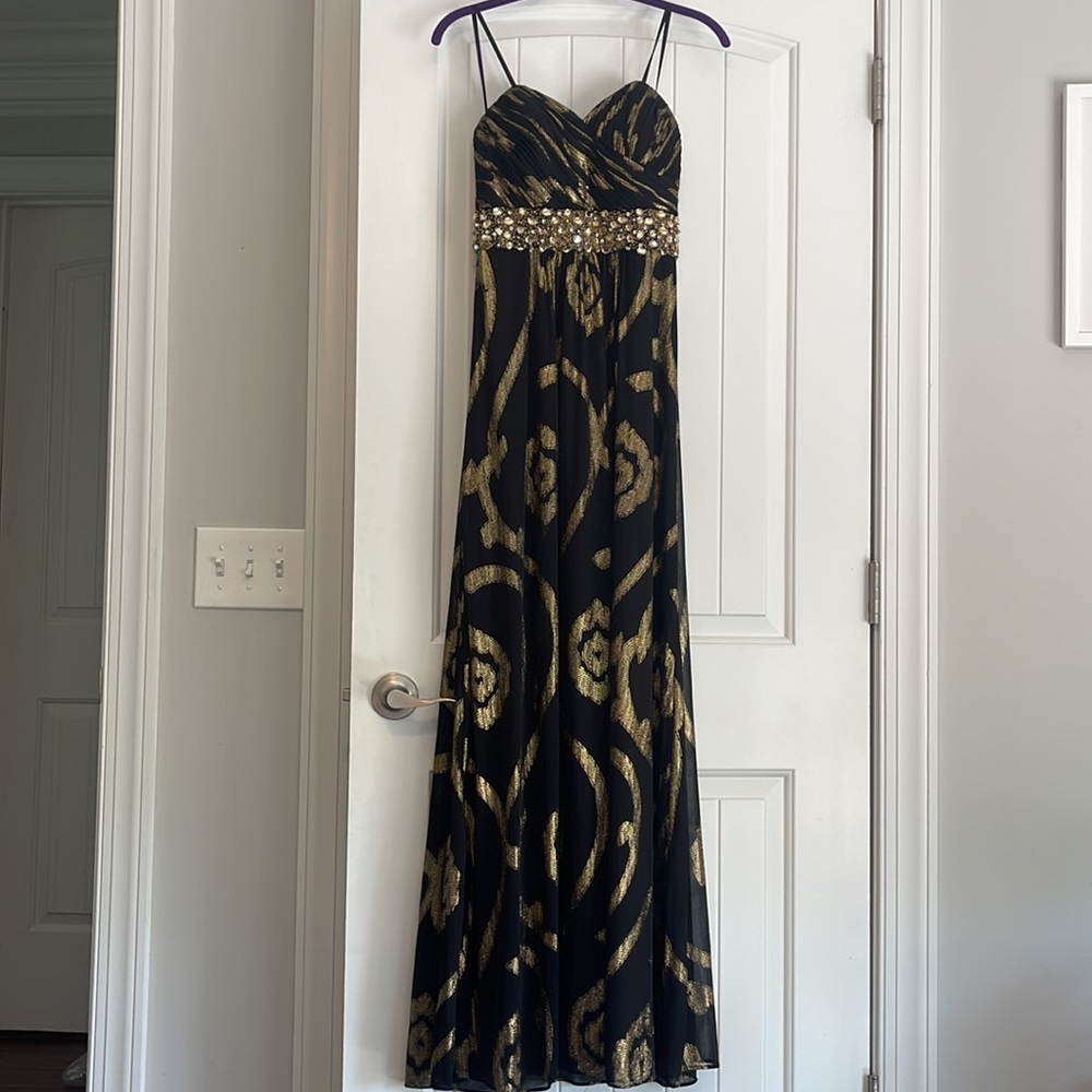 Betsy & Adam black and gold beaded strapless gown